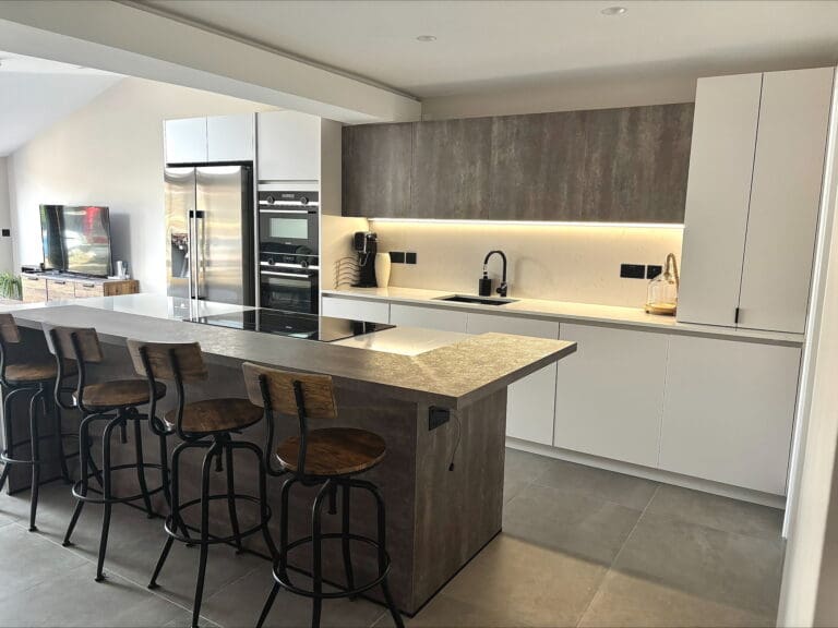 Modern Taupe Handleless Kitchen with Industrial Oxide Accents