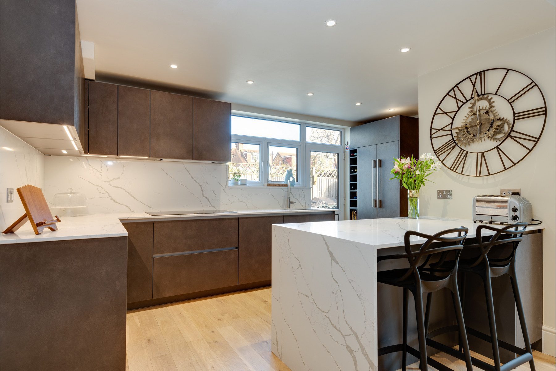 Contemporary bronze kitchen | Osborne Interiors, Chiswick